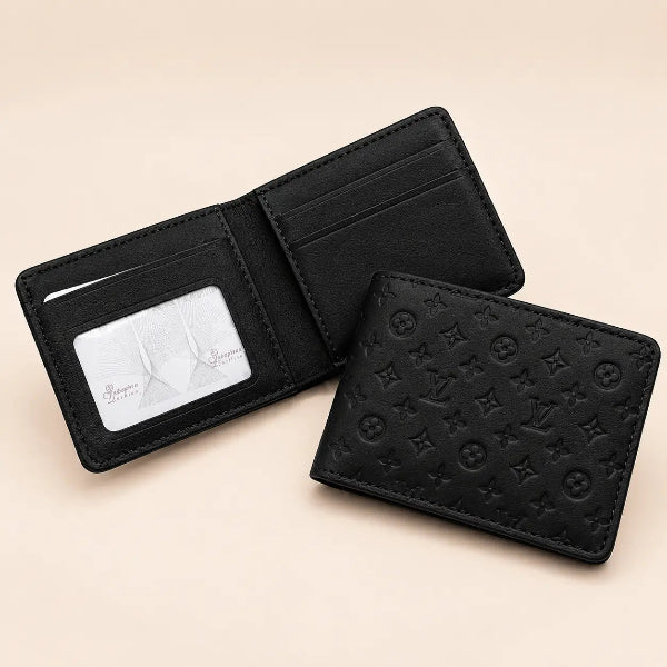 A black leather bi-fold wallet shown open and closed on a light beige background. The closed wallet features an embossed monogram pattern, and the open wallet reveals card slots, a clear ID window with a white card, and an interior lining.