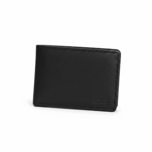 Black leather wallet held by a gloved hand on a wooden surface