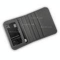 A dark gray textured leather wallet case shown open, featuring multiple card slots and a vertical ID card holder with a sample card inserted. The wallet is photographed on a white background with faint diagonal watermarks.